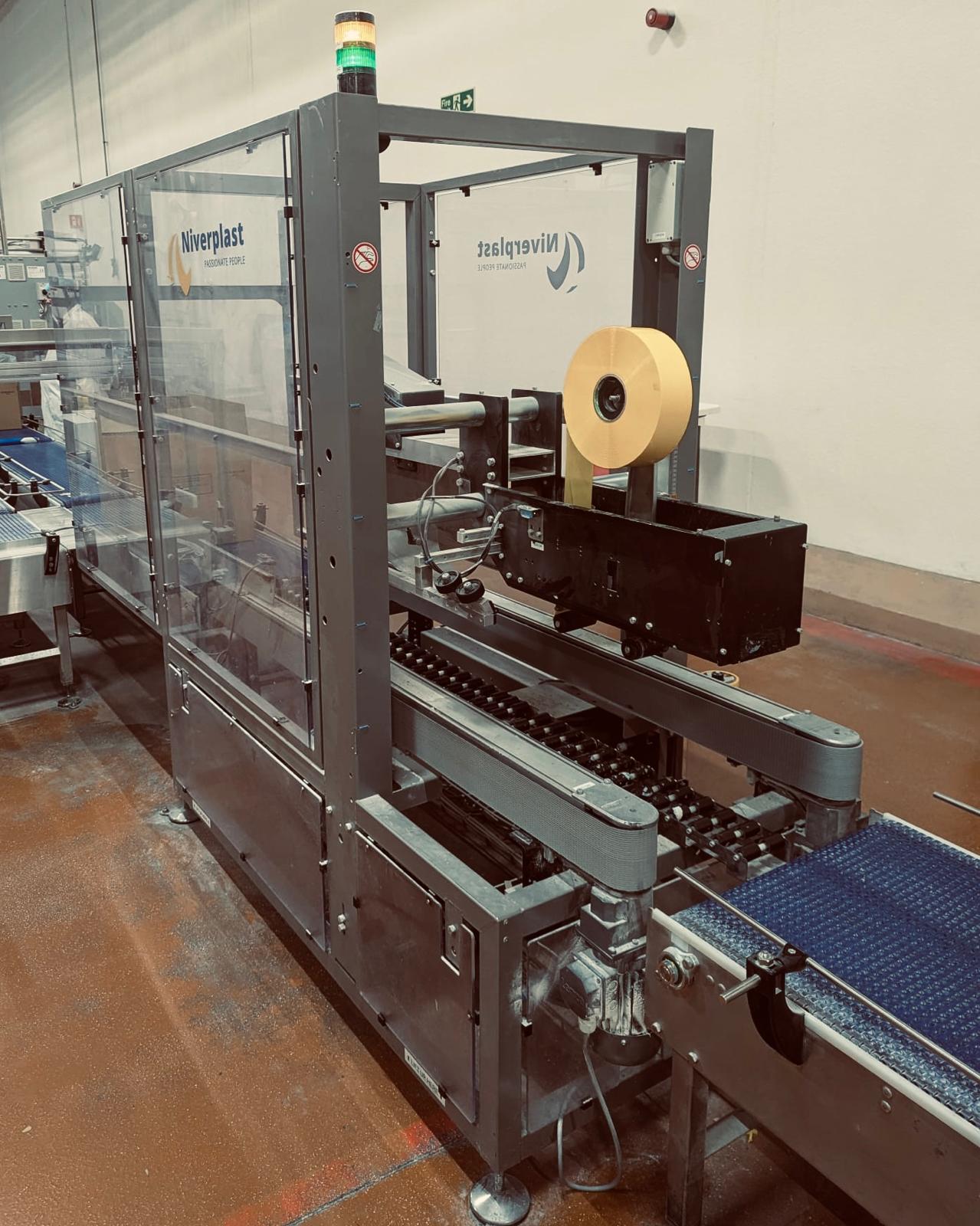 Carton sealing machinery on a packing line