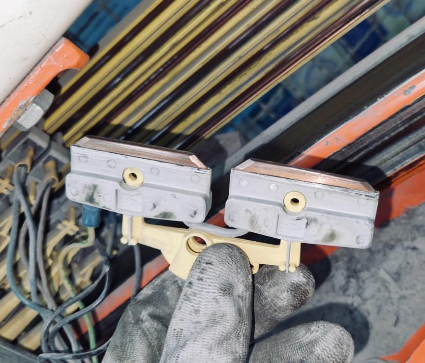 Drive belts and rollers inside pallet wrapping machinery