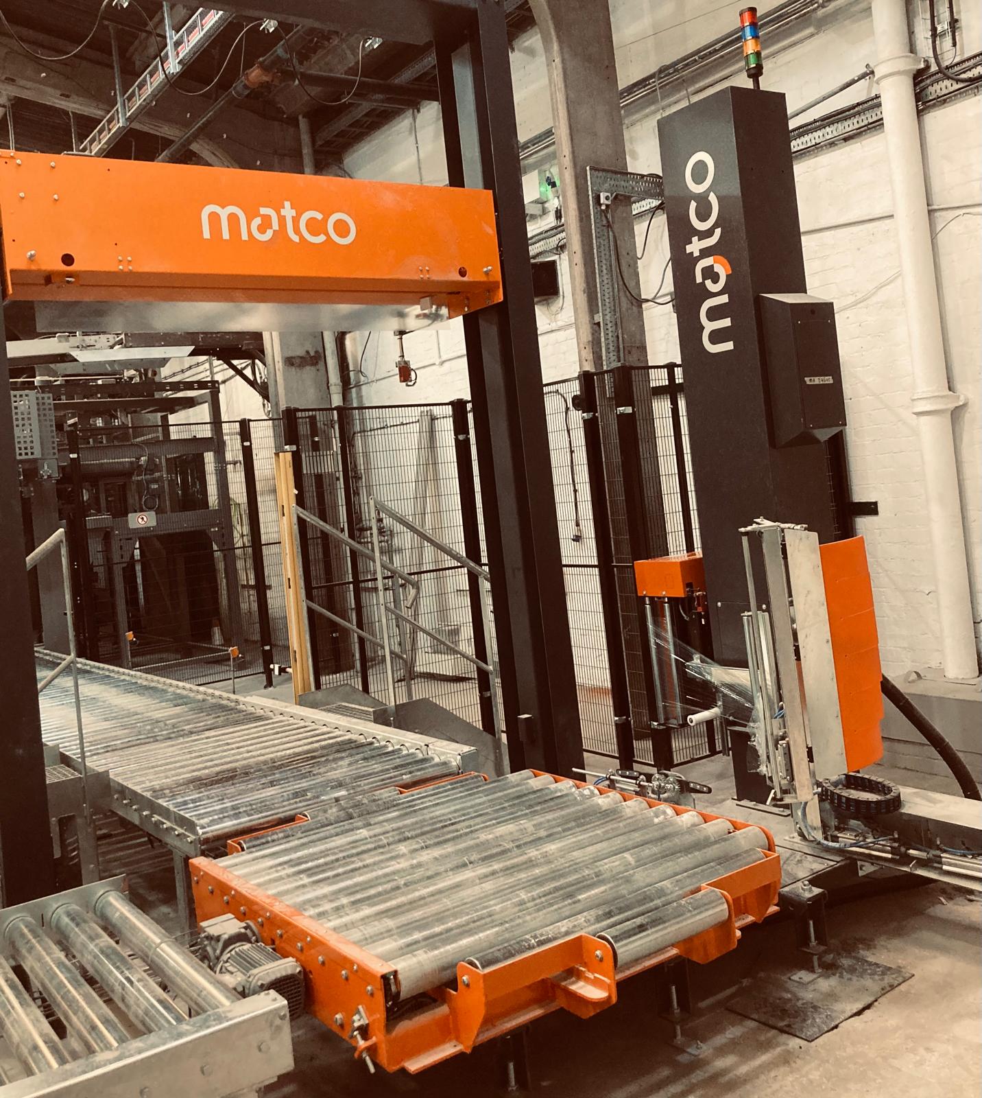 Pallet wrapping machinery and conveyor line