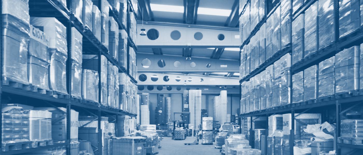 Racked, pallet-wrapped stock in a distribution warehouse